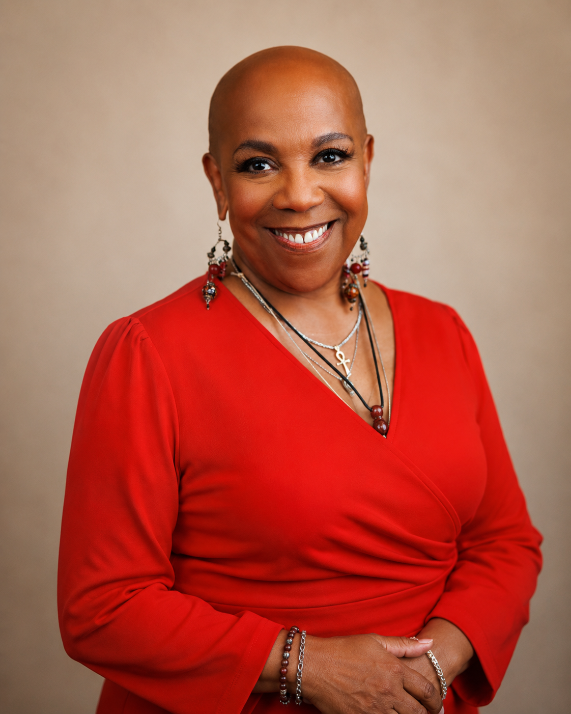 Dr. Anita Caprice Powell — founder of the TAPN2U Movement and ESWP, smiling warmly in a red blouse